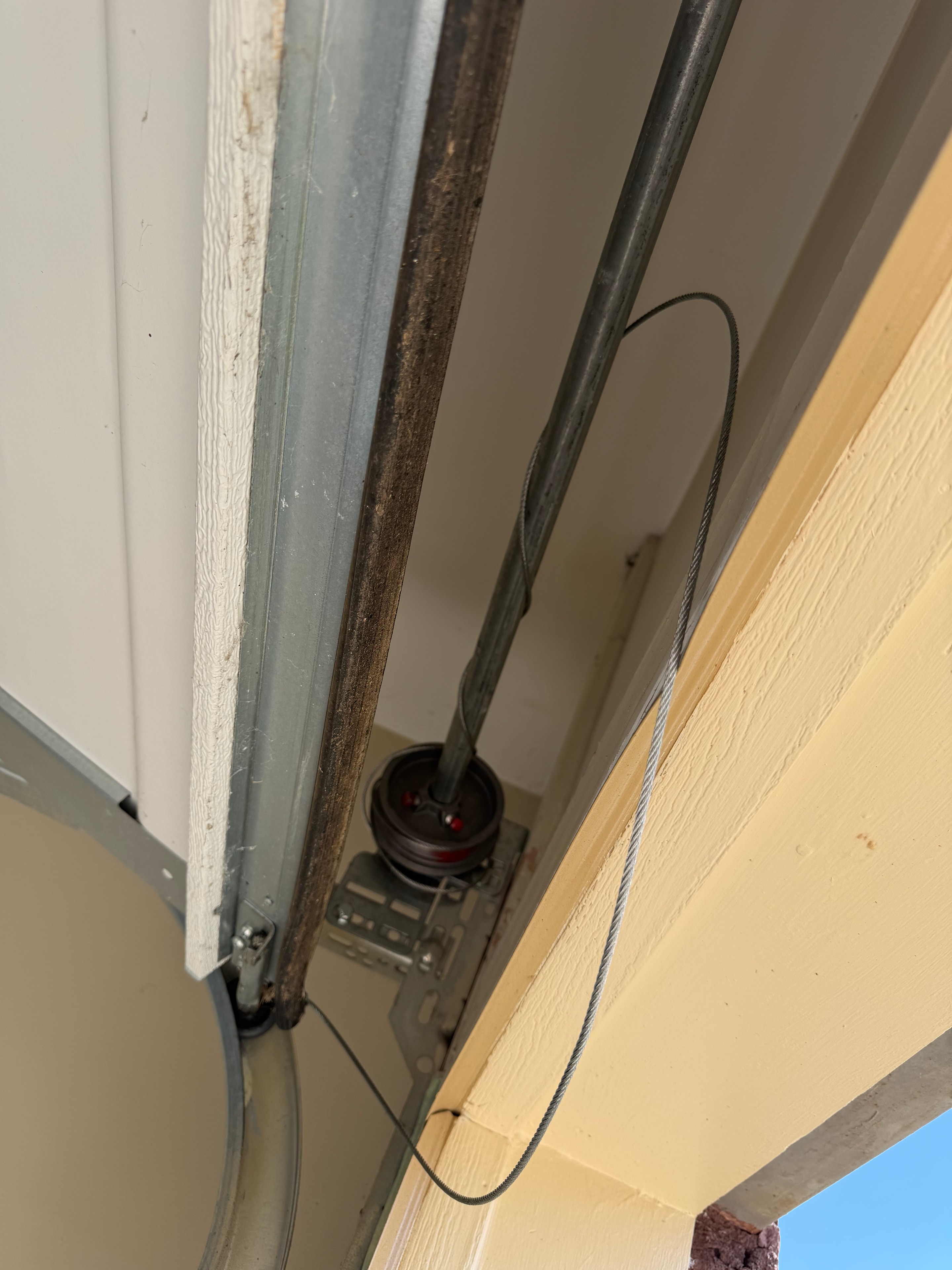 Garage door wiring and sensor repair
